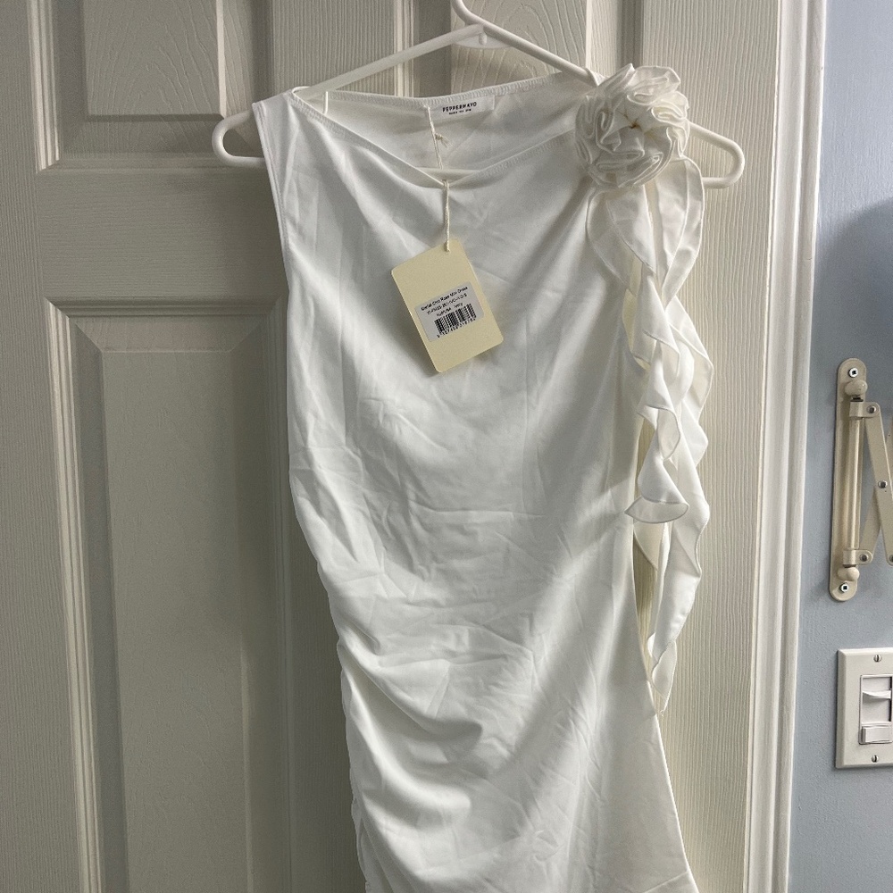 White bodycon sleeveless mini dress